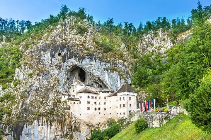 Pickup in central Ljubljana, both entries and an English-speaking driver-guide, on a tour of Predjama Castle, castle tours in Europe